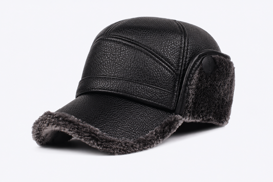 Black leather cap with fur trim on a white background